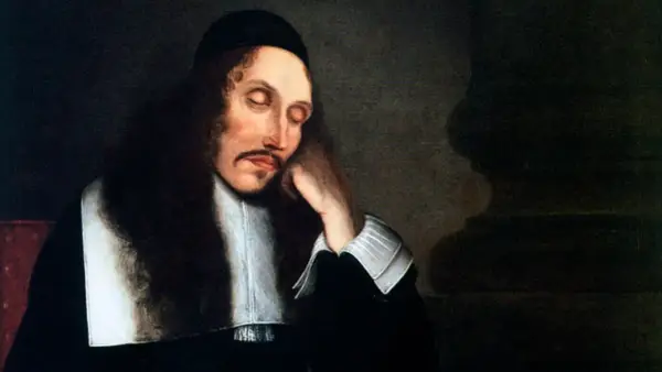 Portret zamyślonego Barucha Spinozy, holenderskiego filozofa, w czarnym stroju i białym kołnierzu.